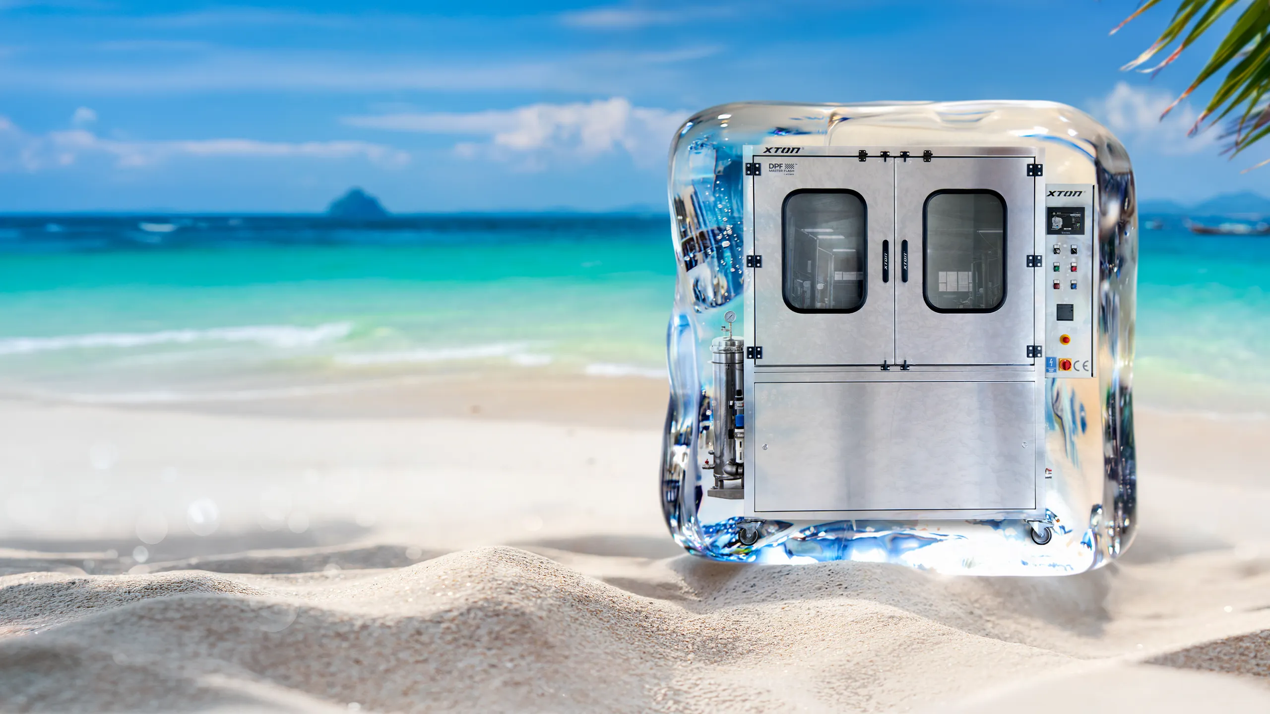 Máquina XTON de regeneración de DPF congelada en un bloque de hielo en una playa